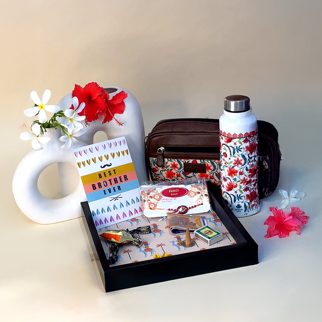 Rakhi Gift Combo Box for Sister – Sling Bag, Tray, Bottle, Rakhi & Card